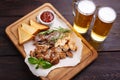 Beer snacks. Grilled pork, chicken, beef on plate