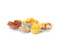 Beer snacks, potato crispy chips, nuts isolated on white background Royalty Free Stock Photo