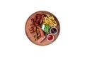 Beer snacks set. Grilled sausages and french fries served with tomato and BBQ sauce. Royalty Free Stock Photo