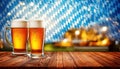 Beer stands in front of a Bavarian backdrop Royalty Free Stock Photo