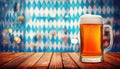 Beer stands in front of a Bavarian backdrop Royalty Free Stock Photo