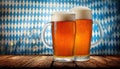 Beer stands in front of a Bavarian backdrop Royalty Free Stock Photo