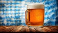 Beer stands in front of a Bavarian backdrop Royalty Free Stock Photo