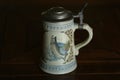 Beer stein with fish painted on side Royalty Free Stock Photo