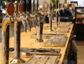 Beer taps on the counter of an Irish pub Royalty Free Stock Photo