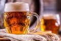 Beer. Two cold beers. Draft beer. Draft ale. Golden beer. Golden ale. Two gold beer with froth on top. Royalty Free Stock Photo