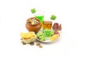 Beer and whiskey and a pot of coins with not many snacks on St. patrick`