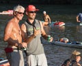 Beers in hand and smiles on their faces Royalty Free Stock Photo