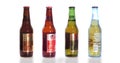 A Beers of Mexico: Tecate, Sol, Dos Equis beer bottles on a white background.
