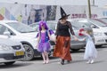 Beersheba, Israel. March 24,Children with their mother in the carnival costumes of Purim on the street of the city