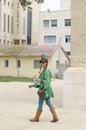 Beersheba, Israel - ÃÂ woman in a green suit on the street. Purim