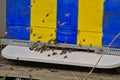 Wooden beehive in yellow and blue