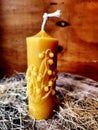 Beeswax handmade candle. Candle pillar beeswax and flowers.