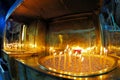 Burning beeswax votive candles in orthodox church - Greece Royalty Free Stock Photo