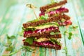 Beet,avocado and arugula sandwich