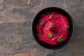 Beet hummus above view on a dark background Royalty Free Stock Photo