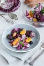 Beet, orange, radicchio, olives salad Royalty Free Stock Photo