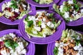 Beet salad with goat cheese, walnuts, greens and herbs and olive oil. Royalty Free Stock Photo