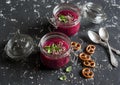 Beet soup in glass jars on a dark background. Royalty Free Stock Photo
