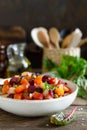 Beetroot or beet salad with boiled vegetables on wooden rustic table Royalty Free Stock Photo