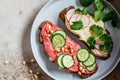 Beetroot and classic hummus toasts, top view. Vegan food concept Royalty Free Stock Photo