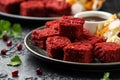 Beetroot and hazelnut bites with pomegranate glaze, vegetarian, vegan party finger food Royalty Free Stock Photo