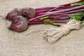 Beetroot on hessian on rustic wooden table Royalty Free Stock Photo