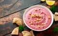 Beetroot Hummus with chickpea, olive oil, lemon and pita bread Royalty Free Stock Photo