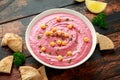 Beetroot Hummus with chickpea, olive oil, lemon and pita bread Royalty Free Stock Photo