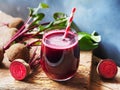 Beetroot juice in glass and fresh organics beetroot.