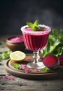 Beetroot juice in a glass and fresh organics beetroot with lemon and mint leaves on rustic wooden table Royalty Free Stock Photo