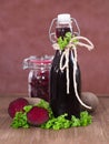 Beetroot juice and inlaid beetroot Royalty Free Stock Photo