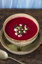 Beetroot soup with feta cheese and fresh thyme