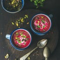 Beetroot soup with mint, pistachio, chia, flax, pumpkin seeds Royalty Free Stock Photo