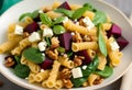 Beetroot, Spinach, and Feta Pasta Delight with a Crunch of Walnuts Royalty Free Stock Photo