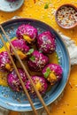 Beetroot sushi-style rolls on a plate with chopsticks Royalty Free Stock Photo