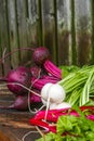 Vertical shot of beets, turnips and greens