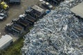 Beg pile of scrap aluminum metal siding from ruined houses after hurricane Ian swept through Florida. Recycle of broken Royalty Free Stock Photo