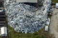 Beg pile of scrap aluminum metal siding from ruined houses after hurricane Ian swept through Florida. Recycle of broken Royalty Free Stock Photo