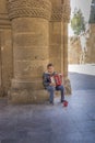 Beggar Boy Playing Accordian