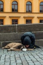 Beggar on the Charles bridge in Prague, Czech