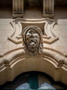The beggar head on Bertini Palace, in Ragusa, Sicily, Italy Royalty Free Stock Photo