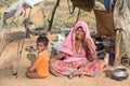 Beggar indian woman and child in Pushkar, India