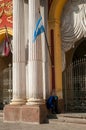 Beggar sitting in front of the Basilica and Monastery of San Francisco in Salta