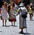 Beggar on the streets of Florence, Italy Royalty Free Stock Photo