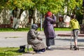 Kaluzhskiy region, Russia - July 2019: Beggars begging near an Orthodox church