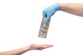 Beggin money from hand in medical gloves passing over white background