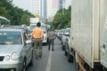 Begging in congested car