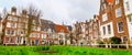 Begijnhof courtyard with historic houses in Amsterdam, Netherlands