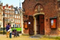 Begijnhof courtyard and people in Amsterdam, Netherlands